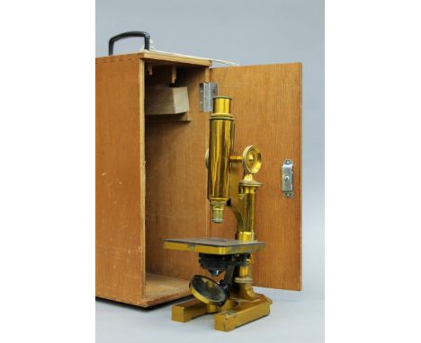 A cased Beck brass microscope, circa 1900. 