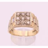 A 9 ct gold gentleman's ring. Ring size V. 7.3 grammes total weight.