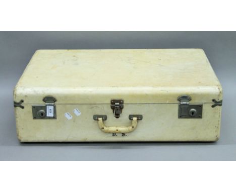A vintage suitcase with insert and red silk lining by Ford Sherington Sydney. 65 cm long.