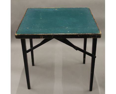 A 20th century baize topped folding card table.