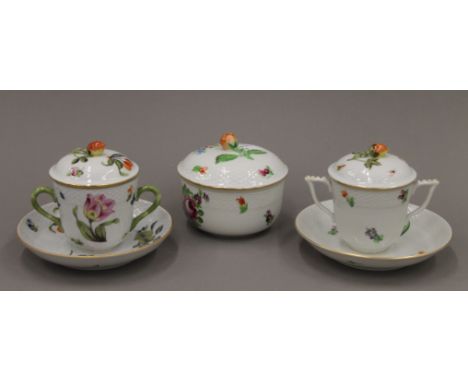 Two Herend porcelain lidded chocolate cups and a sucrier. 