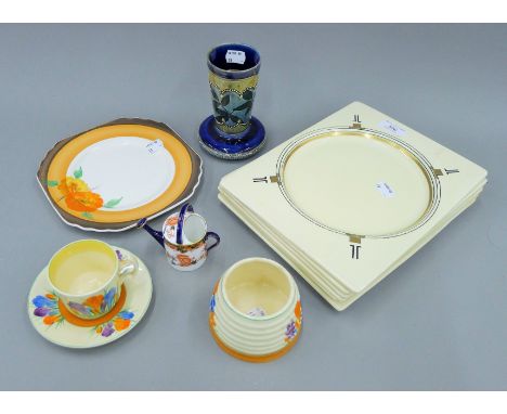 A quantity of porcelain, including Doulton, Clarice Cliff and Royal Crown Derby.