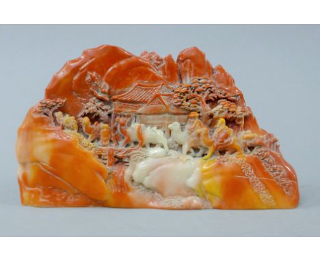 A model of a hardstone boulder carving. 23 cm wide.