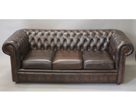 A Chesterfield settee. Approximately 190 cm wide.