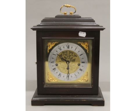 A vintage mantle clock. 37 cm high.