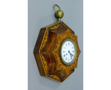 A 19th century French inlaid rosewood wall clock. 43 cm wide.