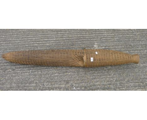 A vintage wicker eel trap. 150 cm long.