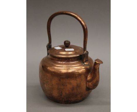 A Japanese copper teapot decorated with a mountainous scene and calligraphy. 27 cm long.