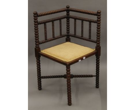 A bobbin turned corner chair. 