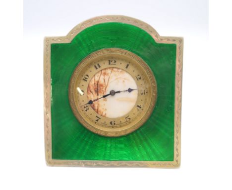 A silver and green enamel strut clock.  10 x 9 cm.