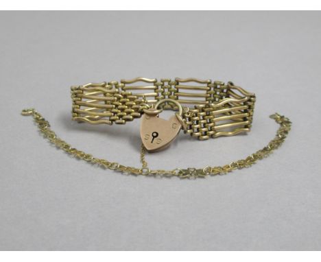 A 9ct yellow gold (hallmarked) gate link bracelet with heart lock - good overall condition, approx weight 18.9 grams - togeth