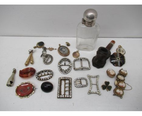 Assorted items to include buckles, brooches, pipe, cut glass bottle etc. 