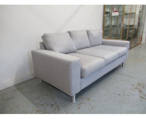 A modern grey cloth three seater sofa - 200cm x 90cm x 90cm 