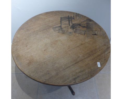 A Georgian mahogany tripod table with a 78cm diameter top 