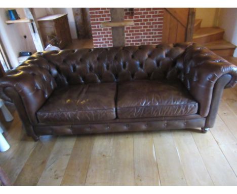 A John Lewis brown leather Chesterfield sofa&nbsp;- as new - 210cm wide