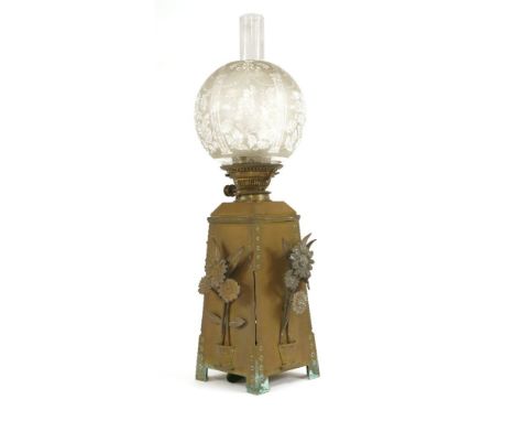An Aesthetic copper and brass oil lamp, of tapering square section, with riveted and pierced corners, each panel mounted with