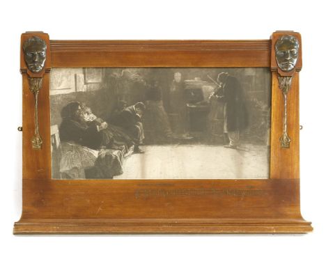 A mahogany picture frame, of tapering form with masks and floral motifs to the sides, with a monochrome print, the base engra