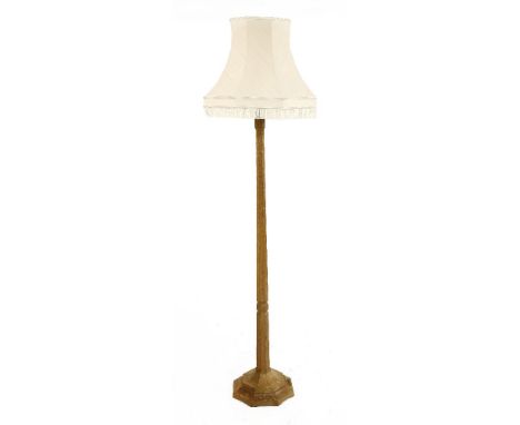 A Robert 'Mouseman' Thompson oak standard lamp,with a shade,180cm high