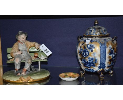 A Capo Di Monte figure group, in the form of a tramp feeding birds on bench, 22cm high, also with Losol ware vase with cover 