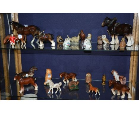 A quantity of ceramic animal figures, to include Beswick owl figure and horses etc (a lot)