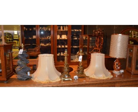 A mixed lot of table lamps, comprising of a pair of brass coated lamps with shades, copper coated lamp with shade, and table 