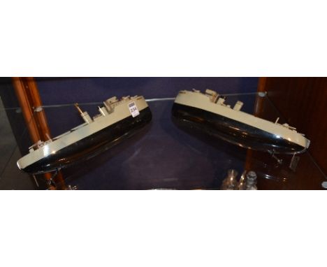 A pair of Sutcliff-England toy automaton warships, with key (one still winds), 31cm long (2)