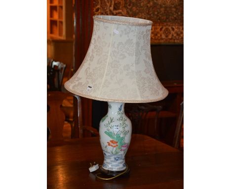 A Chinese ceramic vase lamp with shade, decorated with floral panels on white ground, 39cm high