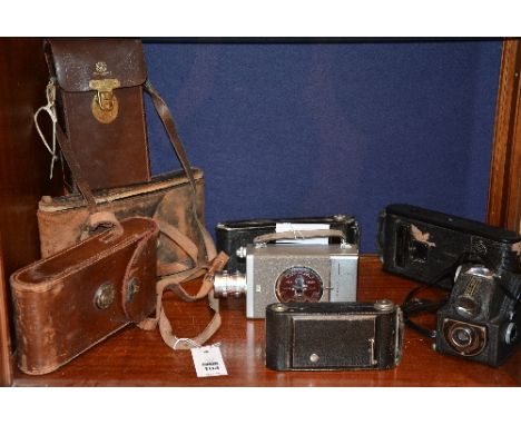 A mixed lot of vintage cameras, to include Bell & Howell 16mm camera, with fitted case, Kodak 'special' with fitted case etc 