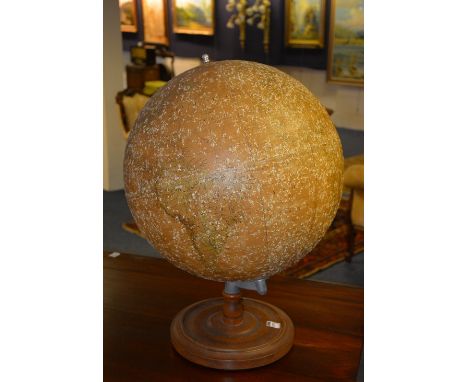 A vintage table world globe, with swivel mechanism, raised on circular wood stand, approx 80cm high CONDITION REPORT: Lot 171