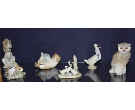 A Lladro figure of a rabbit in foliage, 11cm wide, together with five Lladro Nao figures of a hound, a duck, an owl, geese an