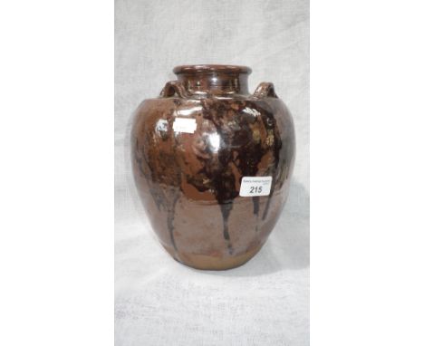 A Japanese Seto ware jar, with brown glaze