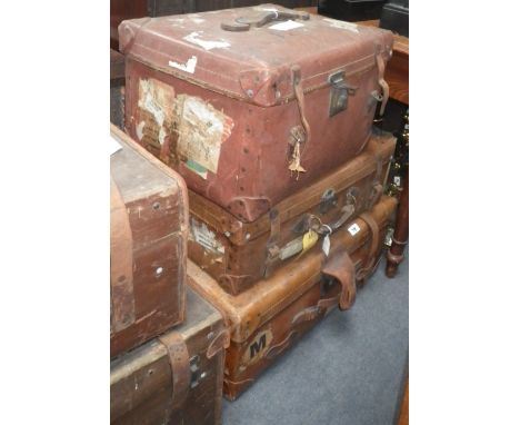 A composition travelling trunk with leather fittings and label for Shaw-Savill Line, together with two others similar
