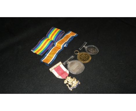 A First World War Pair awarded to Captain C.R. Graham and other badges