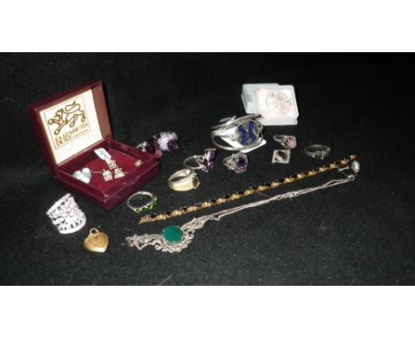 A silver gilt sapphire-set bracelet and a collection of other stone-set jewellery including an amethyst and pearl brooch