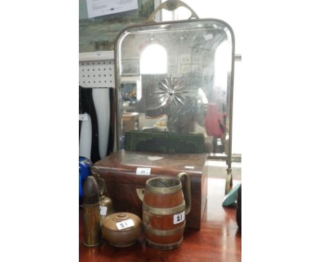 A Victorian brass framed fire screen with mirrored panel, a trench art shell case and similar items