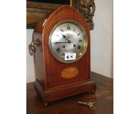 A late Victorian mahogany and boxwood inlaid mantel clock with silvered dial 12" high