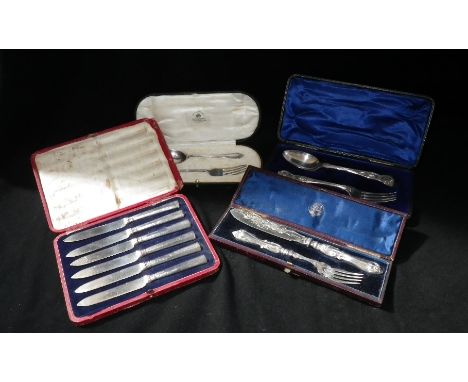 Two cased christening sets, comprising, fork and spoon (one by Mappin & Webb Ltd), a cased set of six silver handled fruit kn