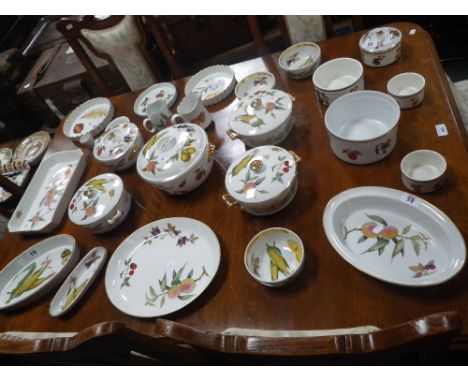 A collection of Royal Worcester 'Evesham' serving dishes, jugs and covered dishes
