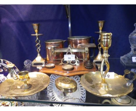 A set of brass postal scales with weights and similar metalware