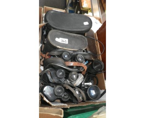 A collection of vintage binoculars including 'Prinz' and other makes