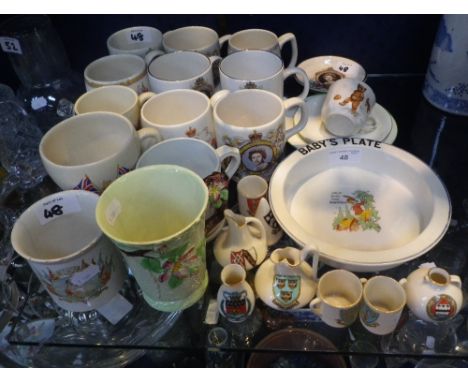 A collection of Goss crested china, a Carlton ware mug and a collection of commemorative ceramics