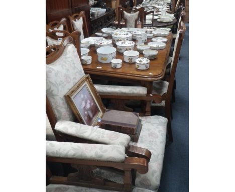 An Edwardian light oak dining suite comprising extending dining table 57" wide (extended) six dining chairs and a pair of mat