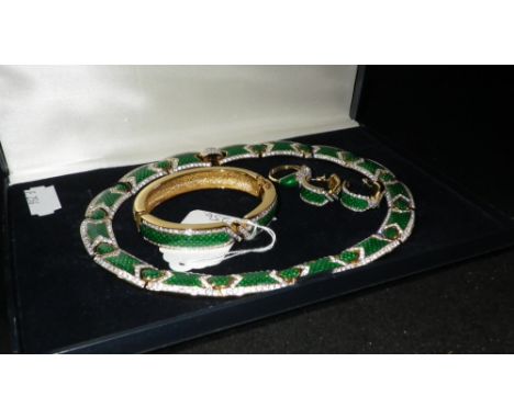 A green enamel and diamante jewellery suite, in gold plate comprising, a collar necklace, bangle, ring and a pair of half-hoo