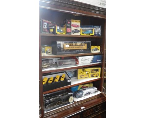 A collection of Corgi and other model collector's vehicles in original packaging 