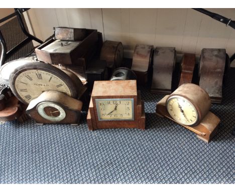 A selection of various clocks, clock faces and barometers, including two hall clocks, mantel clocks, wall hanging clocks, etc