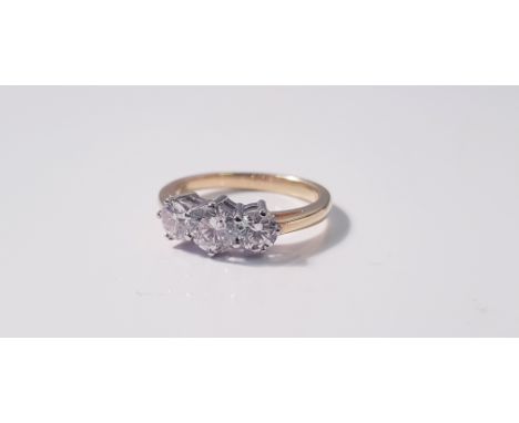 A three stone diamond ring, set with three graduated round brilliant cut diamonds, the principal measuring approx. 0.55ct, fl