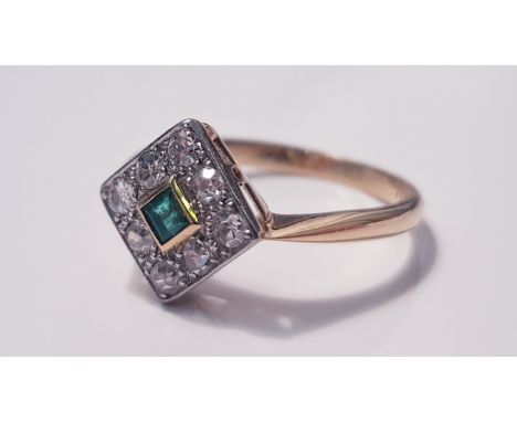 A yellow gold emerald and diamond cluster ring, marked 18ct, ring size M 1/2, approx. weight 1.91gms. IMPORTANT: Online viewi