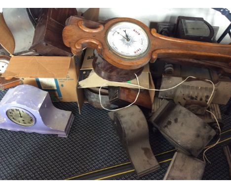 A selection of various clocks, clock faces and barometers, including mantel clocks, wall hanging clocks, etc. IMPORTANT: Onli