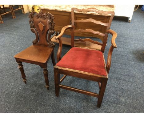 An early 19th century mahogany carver dining chair with ladder back together with a mahogany hall chair. IMPORTANT: Online vi