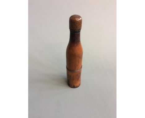 A turned fruitwood portable pipe in the for. Of a bottle, inscribed to copper cap ‘William Taylor Pontypool/ From Weston’. IM